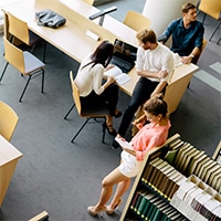 North Tampa 11 sober living | Real Recovery Education Opportunities at the University of South Florida group of students studying in library