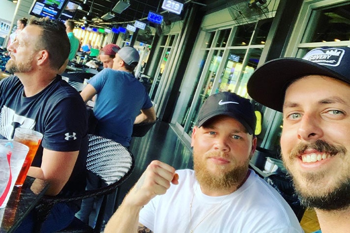 staff | Our Team Patrick and John with the TopGolf community event experiencing life in sobriety