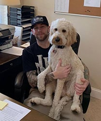 staff | Real Recovery Jon Stob working with his dog