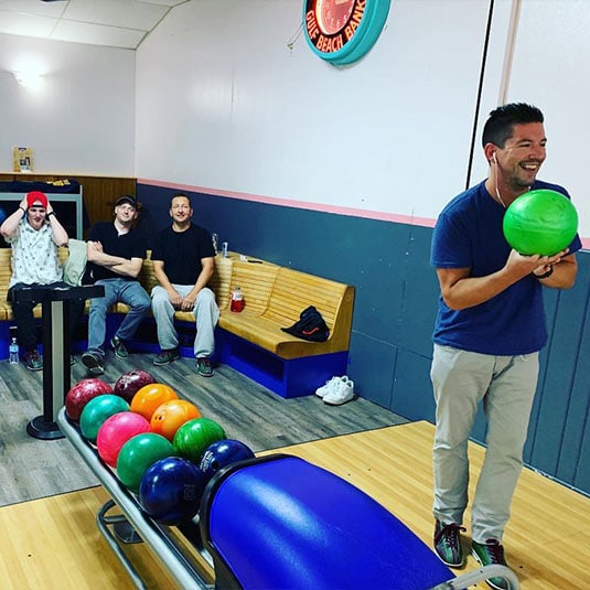 Real Recovery Sober Living for Men Program Community Activities Bonding with Friends Bowling in Sobriety