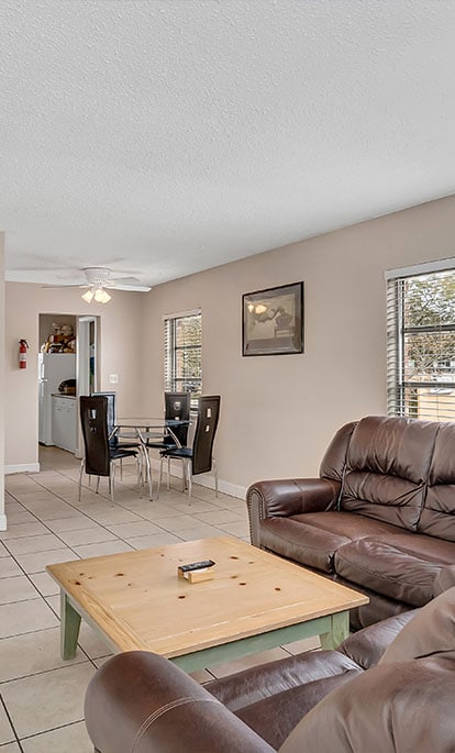 st. petersburg addiction treatment | Real Recovery Sober Living for Men St Petersburg Recovery Residence spacious interior living room mobile hero