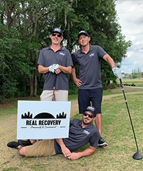 Real Recovery sober living program administrators charity golfing to fight addiction event